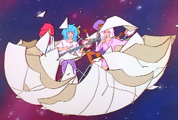Music video retakes scene, oh Jem and the Hologram hatching from an egg, good idea???