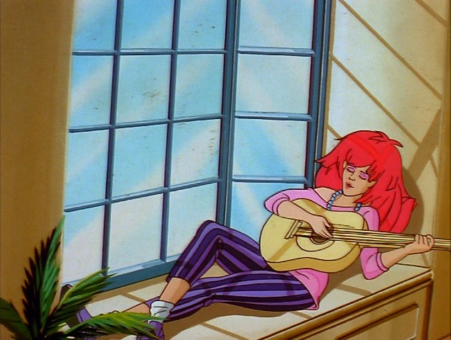 Kimber playing an acoustic guitar